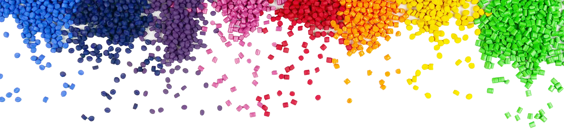 Granulate in den Farben eines Regenbogens